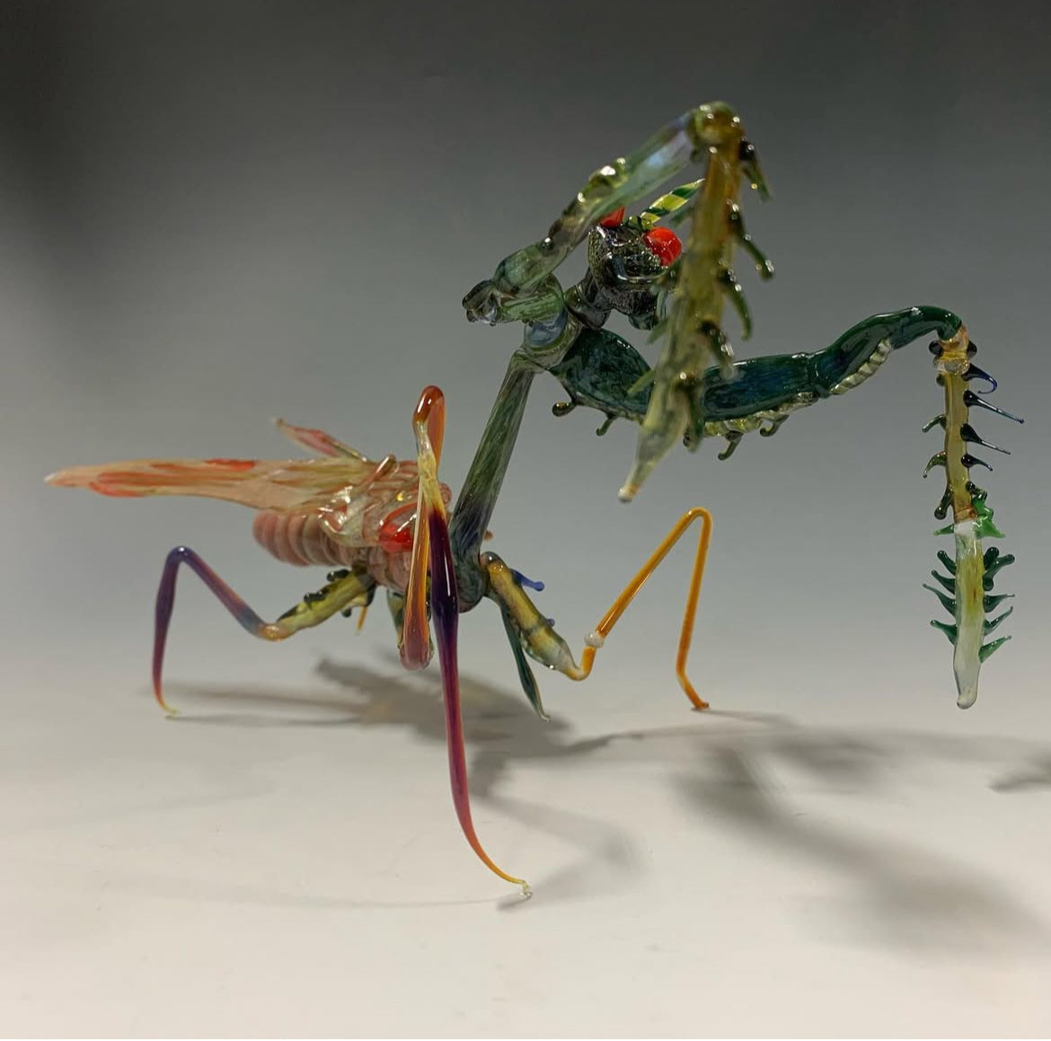 Glass praying mantis